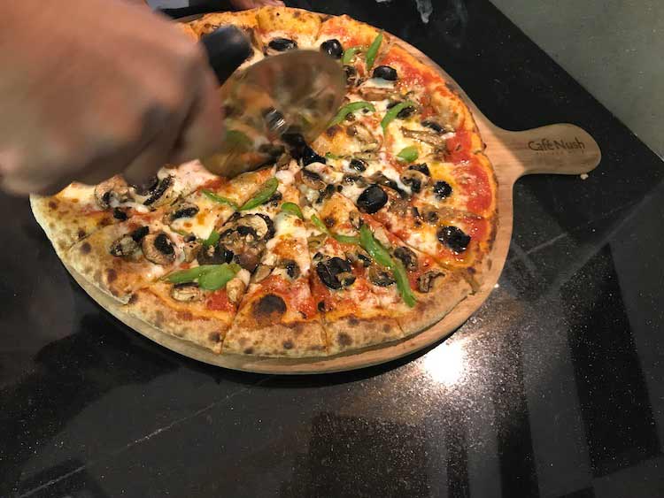 Slicing pizza